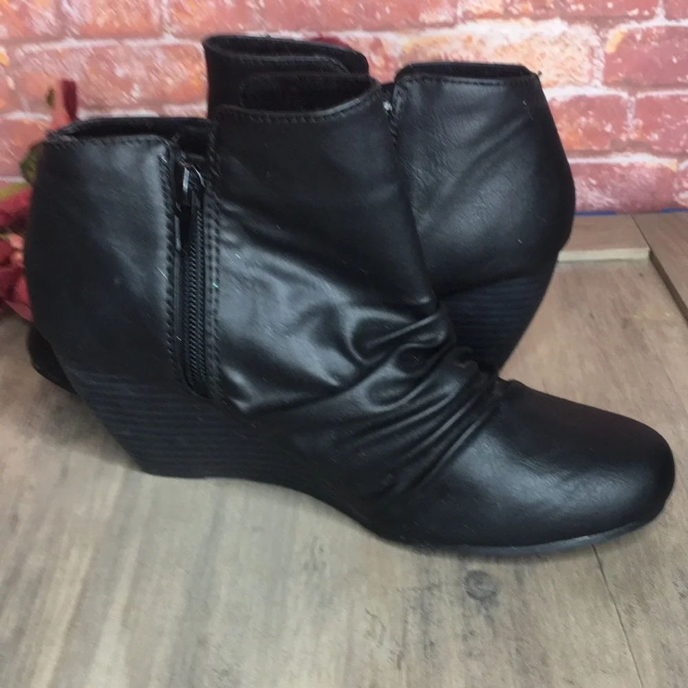 Blowfish’s Malibu Black Slouchy Faux Leather Wedge Ankle Booties